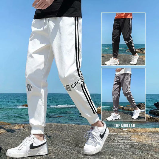2021 casual pants men's Korean version of loose casual trend rod strips fashion small feet young people nine pants